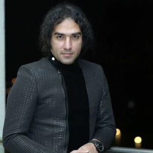 دانلود آهنگ رضا یزدانی تو خودم میسوزم